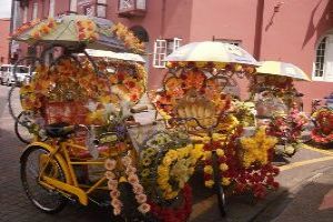 Tap your feet with ear-splitting Trishaws in Melaka